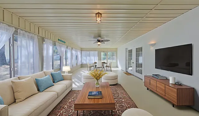 a view of a hallway with seating area