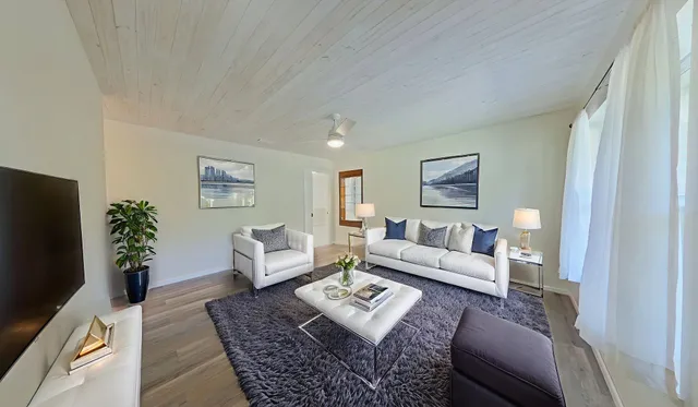 a view of an empty room and glass door