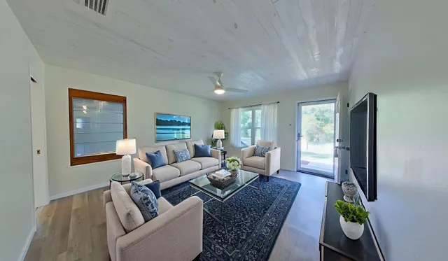 a kitchen with a table and chairs