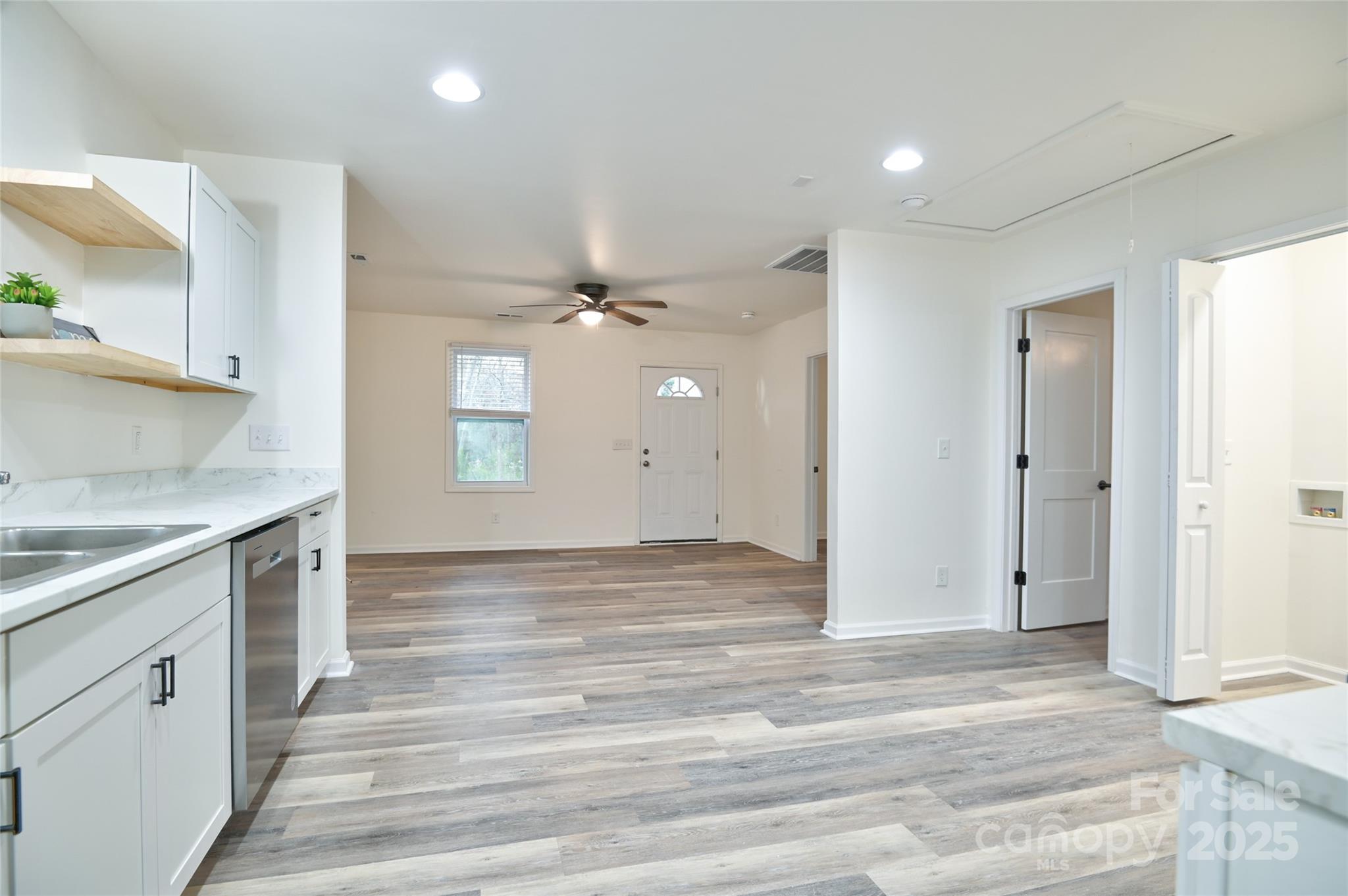 313 Heyward Street Rock Hill, SC 29730 - Photo 3 of 29 a view of a kitchen with a sink and cabinets