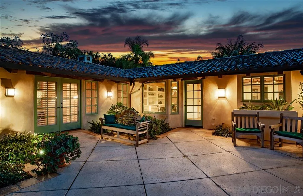 6146 Paseo Valencia Rancho Santa Fe, CA 92067 - Photo 2 of 25 a living room filled with furniture and a potted plant