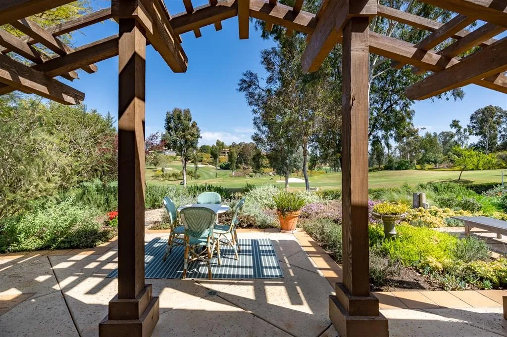 6146 Paseo Valencia Rancho Santa Fe, CA 92067 - Photo 24 of 25 a view of a porch with furniture and garden