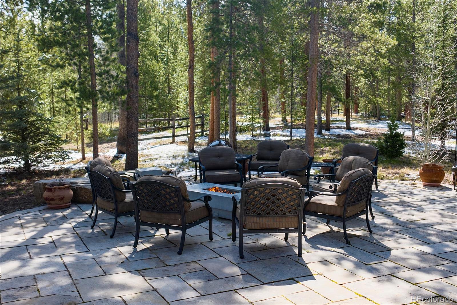 148 County Road Tabernash, CO 80478 - Photo 37 of 45 a couple of chairs sitting in a yard next to a road