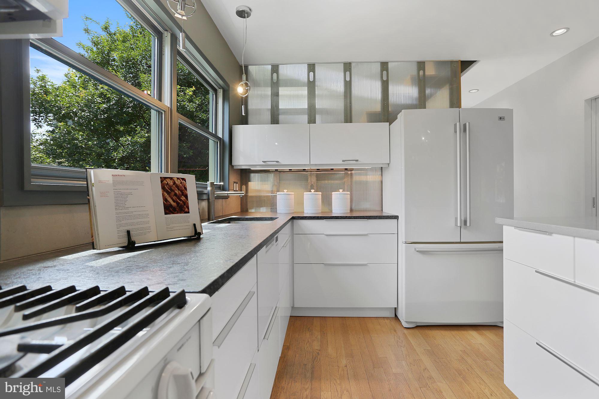 25 East Braddock Road Alexandria, VA 22301 - Photo 16 of 81 bright white cabinetry and soapstone counters