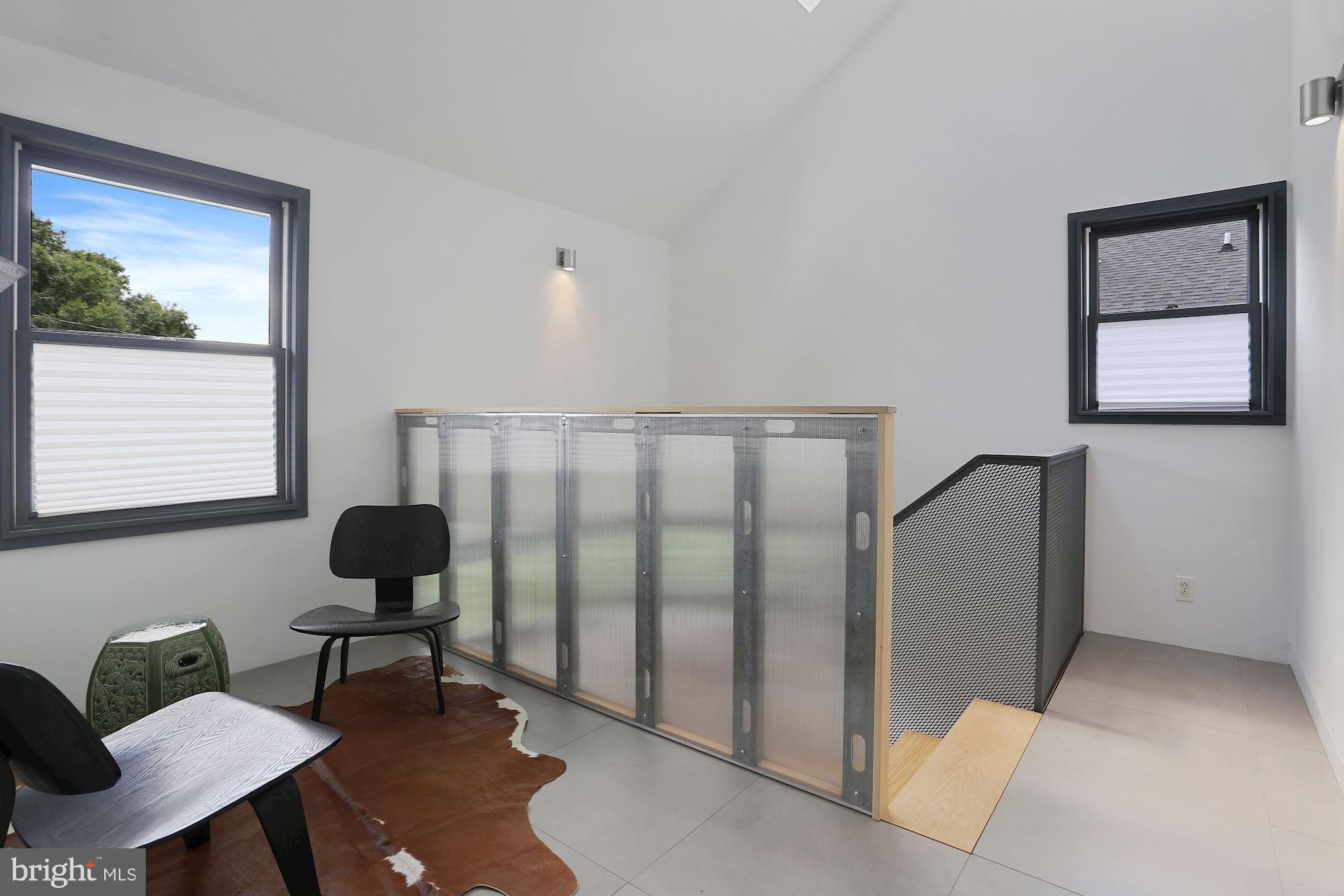 25 East Braddock Road Alexandria, VA 22301 - Photo 41 of 81 Skylight in stairwell and large reading nook!