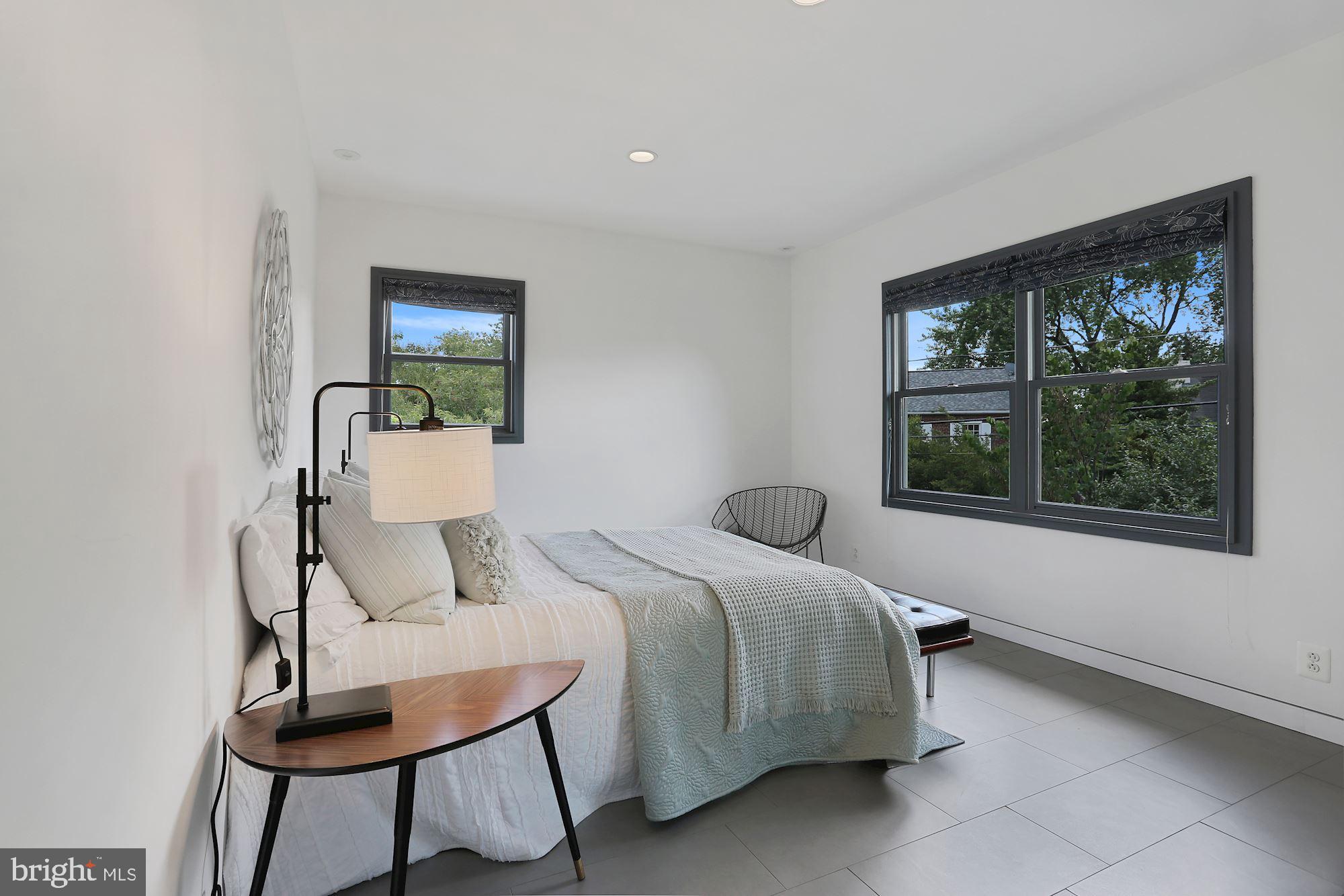 25 East Braddock Road Alexandria, VA 22301 - Photo 43 of 81 Primary bedroom w/ recessed lights & roof top view
