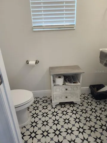 a bathroom with a sink and a toilet