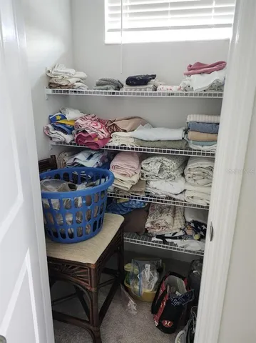 a kitchen with a stove and cabinets
