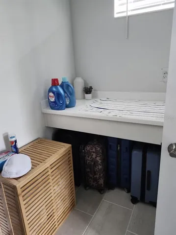 a bedroom with a bed and dresser