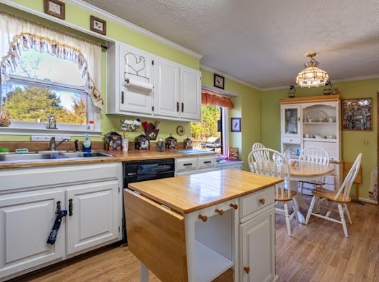 165 Lake Creek Road Cedartown, GA 30125 - Photo 17 of 28 a kitchen with a sink cabinets and wooden floor