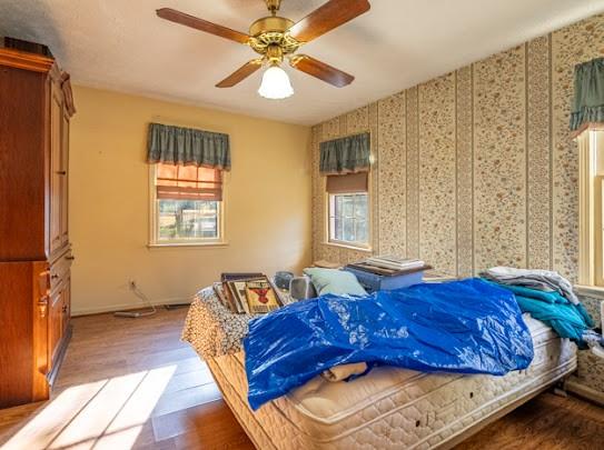 165 Lake Creek Road Cedartown, GA 30125 - Photo 24 of 28 a bed sitting in a bedroom next to a window