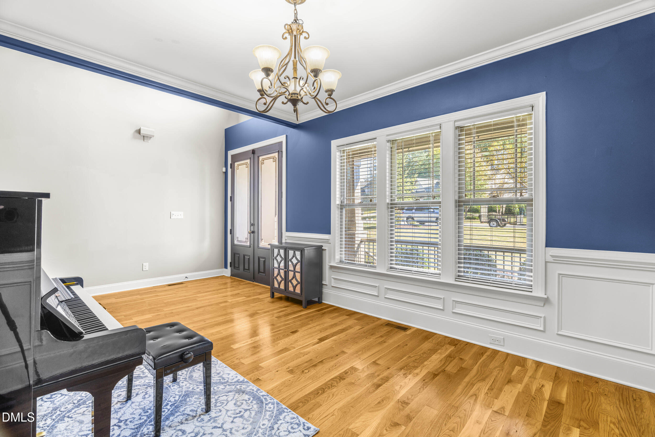 648 Fieldtrial Circle Garner, NC 27529 - Photo 11 of 56 a bedroom with a bed and ceiling windows