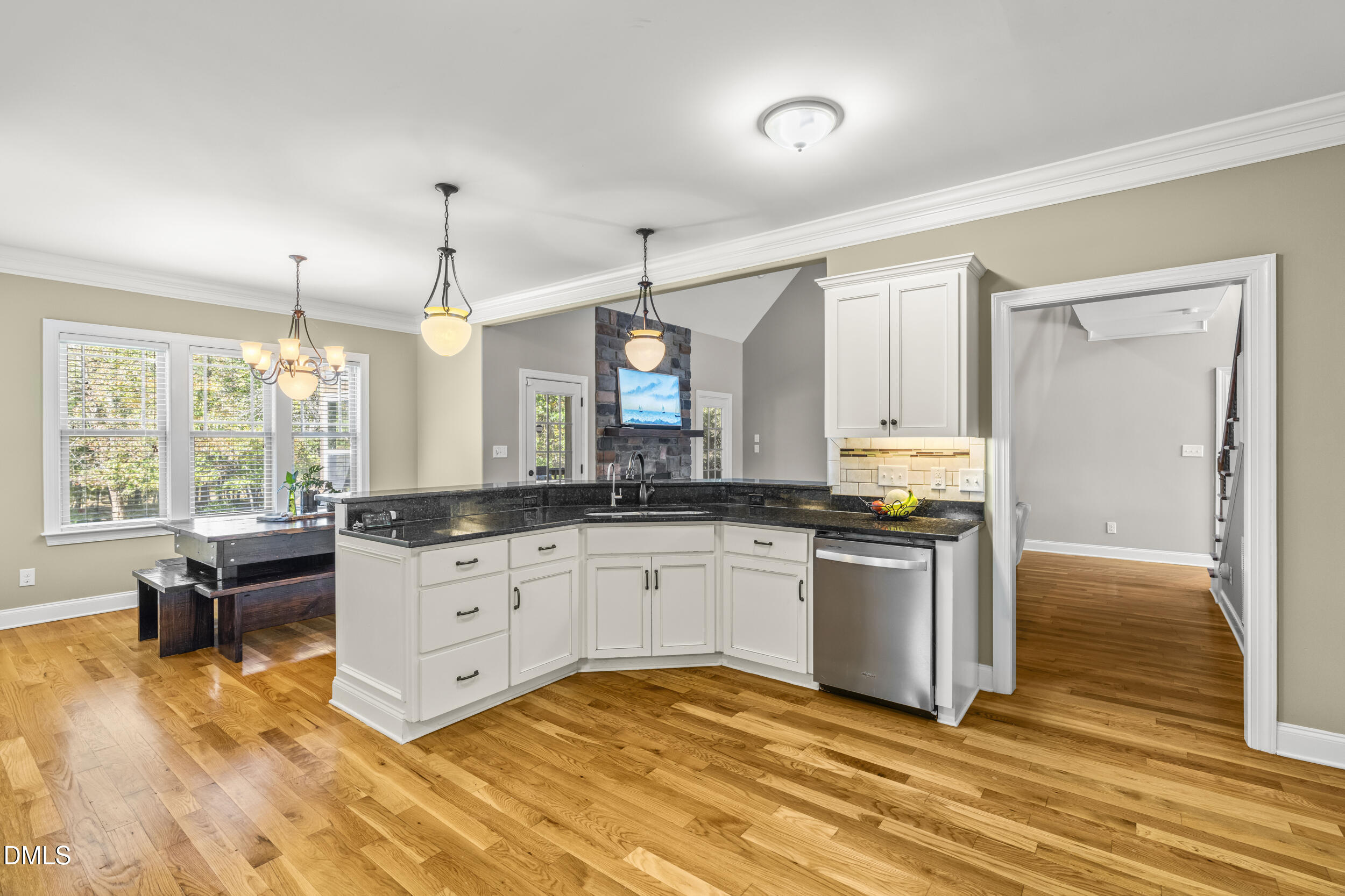648 Fieldtrial Circle Garner, NC 27529 - Photo 18 of 56 a large kitchen with kitchen island a sink stainless steel appliances and cabinets