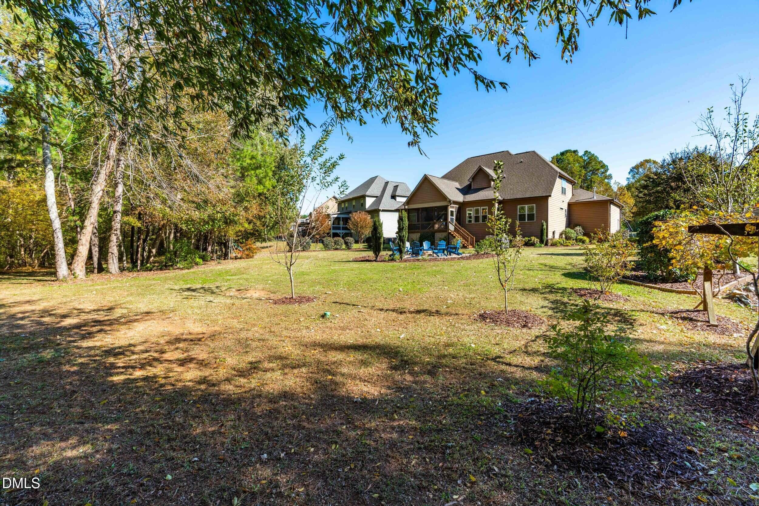 648 Fieldtrial Circle Garner, NC 27529 - Photo 49 of 56 a front view of a house with a yard