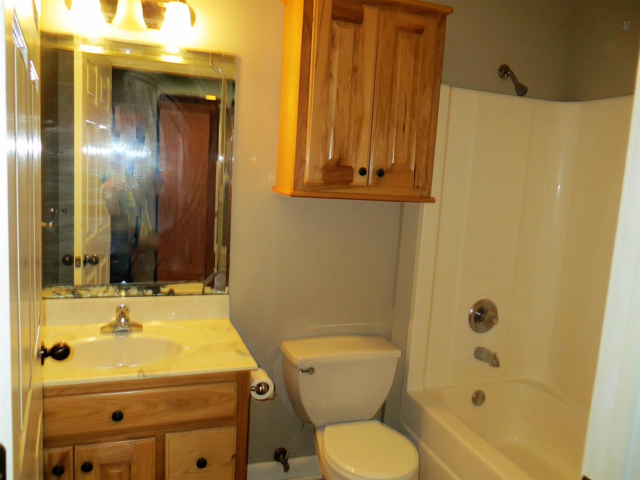 150 Crystal Springs Road Kelso, TN 37348 - Photo 15 of 21 a bathroom with a sink a toilet and shower