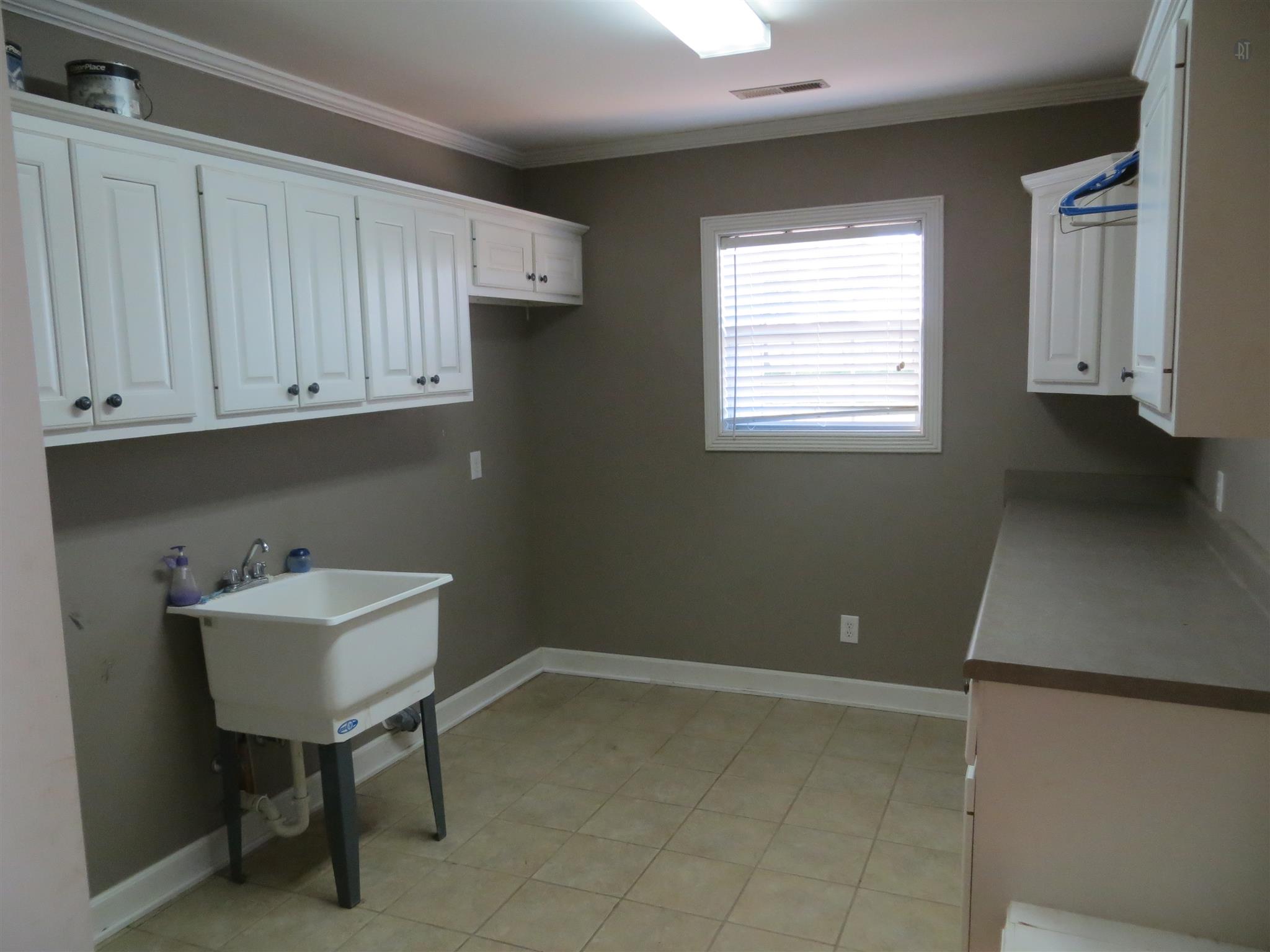 150 Crystal Springs Road Kelso, TN 37348 - Photo 18 of 21 a bathroom with a sink and a cabinets