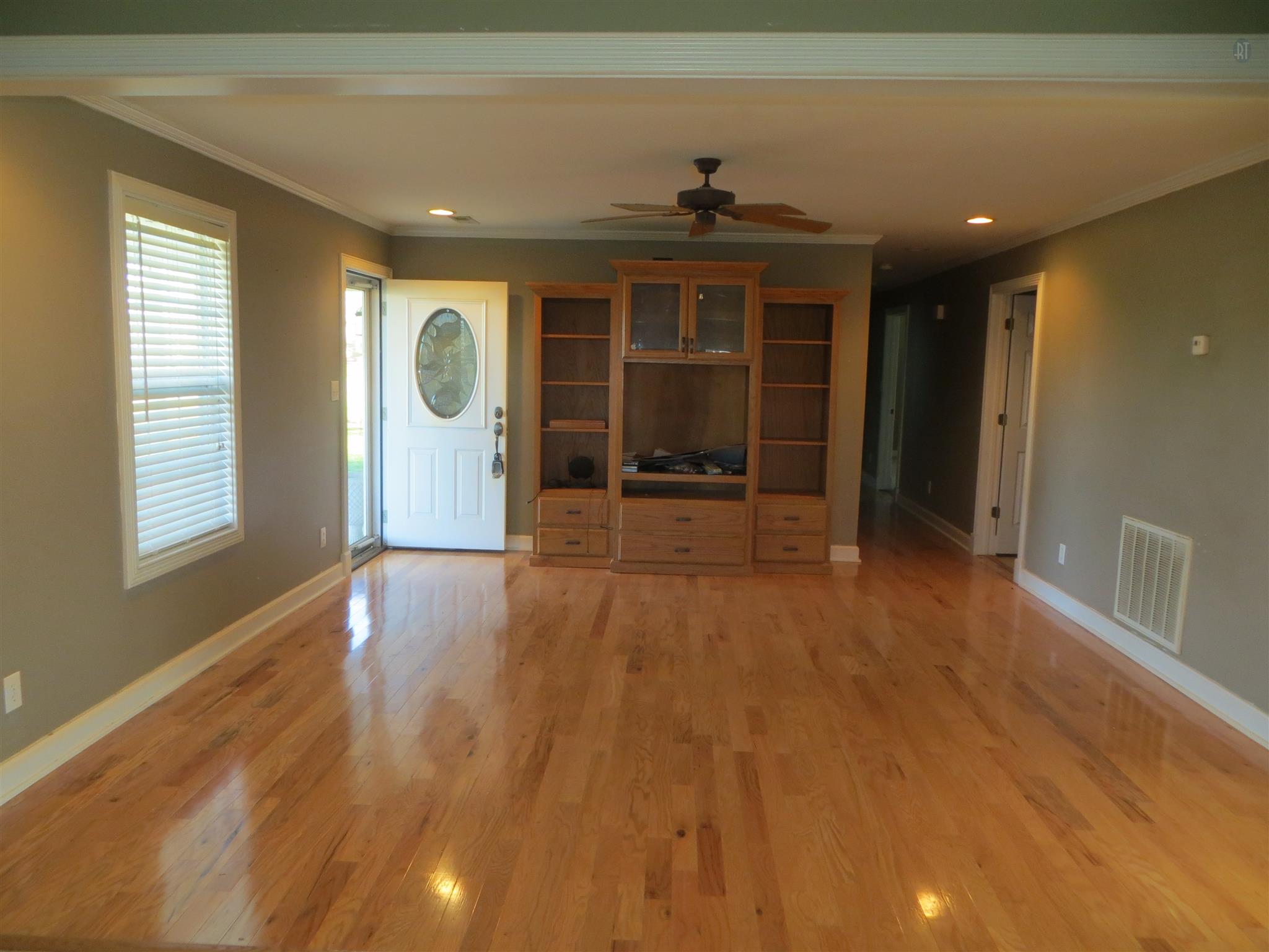 150 Crystal Springs Road Kelso, TN 37348 - Photo 19 of 21 wooden floor in an empty room with a window