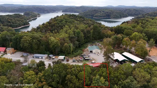 an aerial view of house with mountain view
