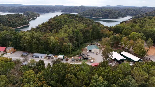 an aerial view of house with mountain view