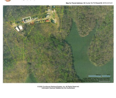 348 Bill Hunter Road Celina, TN 38551 - Photo 46 of 49 a picture of a bathroom with a shower curtain