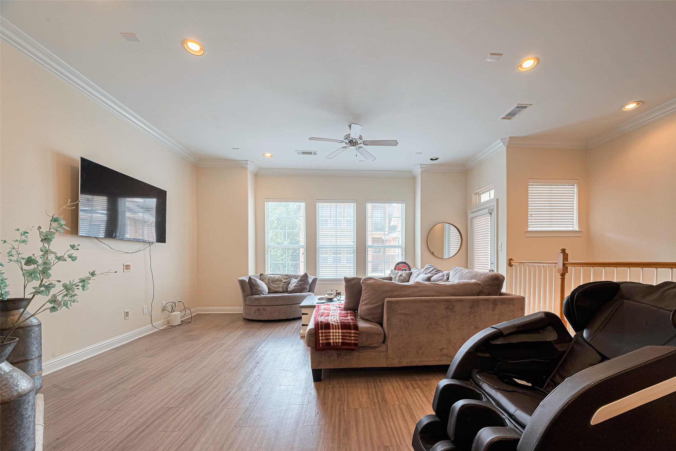 24 Versante Court Houston, TX 77070 - Photo 22 of 30 a living room with furniture and wooden floor