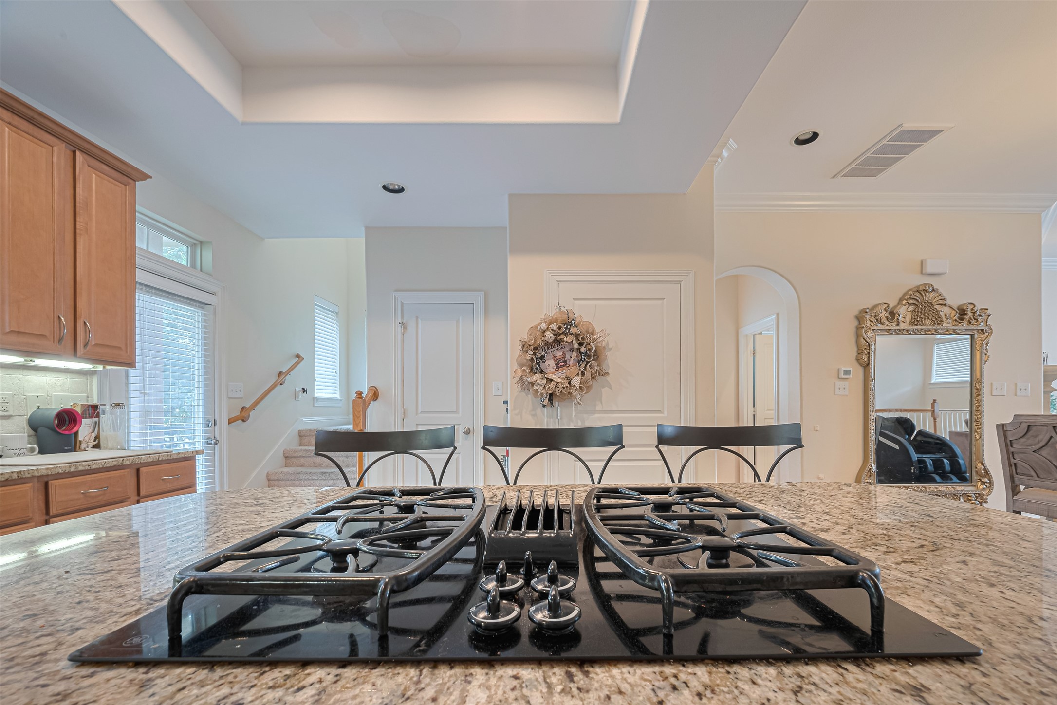 24 Versante Court Houston, TX 77070 - Photo 25 of 30 a view of a kitchen with stainless steel appliances stove top oven and cabinets