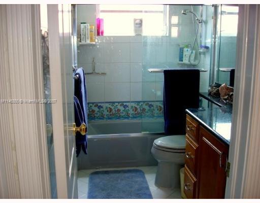 10500 Southwest 140th Road Miami, FL 33176 - Photo 13 of 16 a bathroom with a toilet and a shower