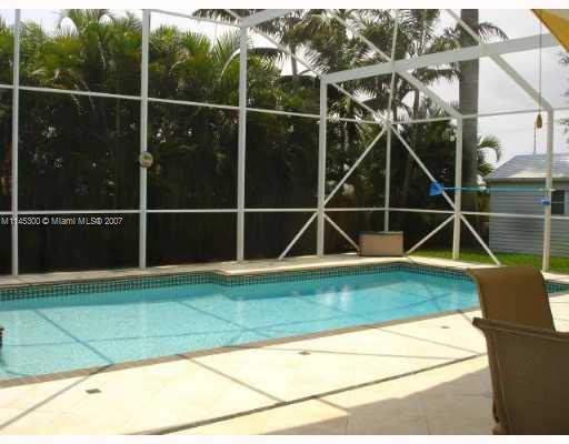 10500 Southwest 140th Road Miami, FL 33176 - Photo 9 of 16 a view of a tennis court