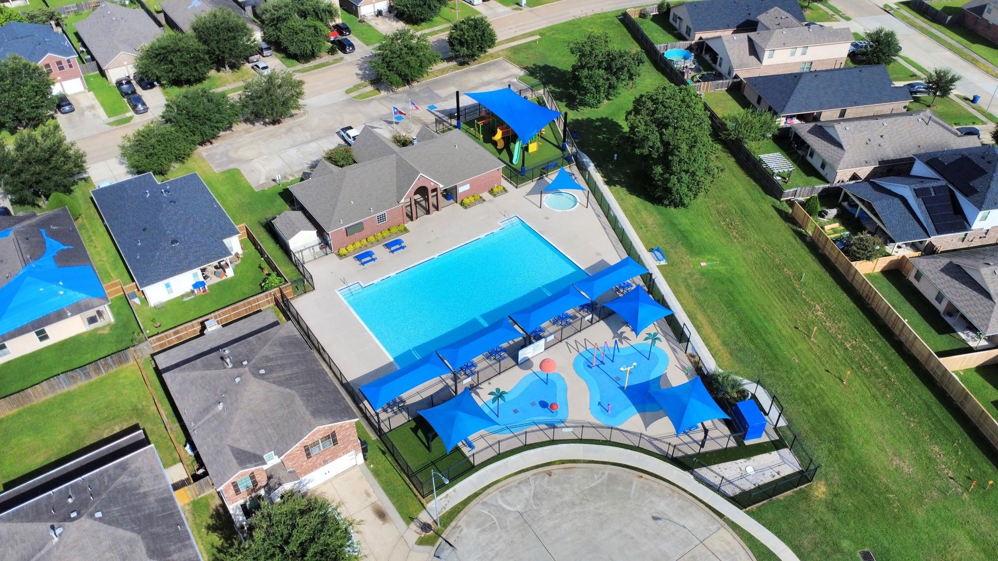 16542 Peyton Ridge Circle Houston, TX 77049 - Photo 16 of 16 an aerial view of a house with a garden and swimming pool