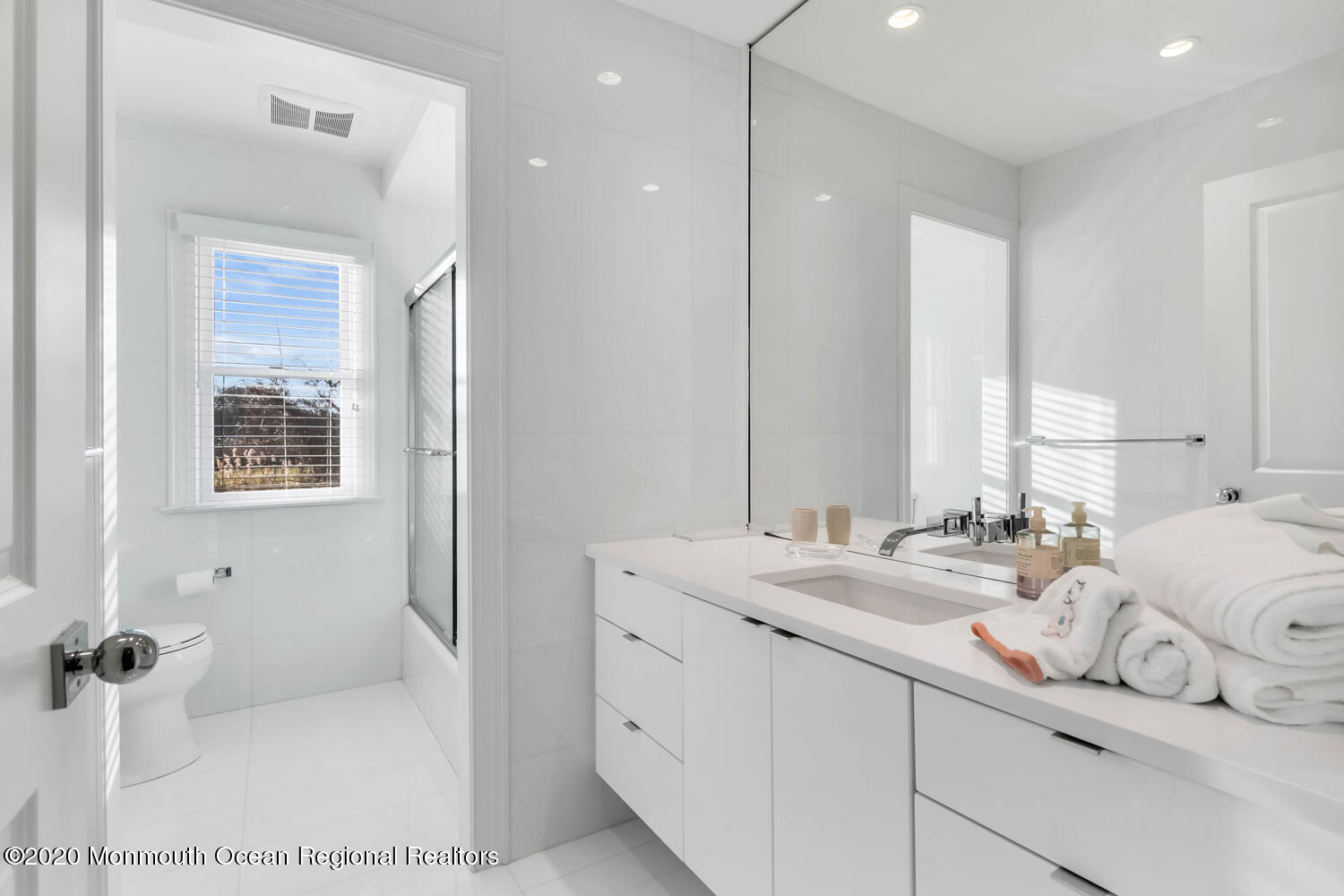 1 Horatius Way Rumson, NJ 07760 - Photo 21 of 24 a bathroom with double vanity and a tub