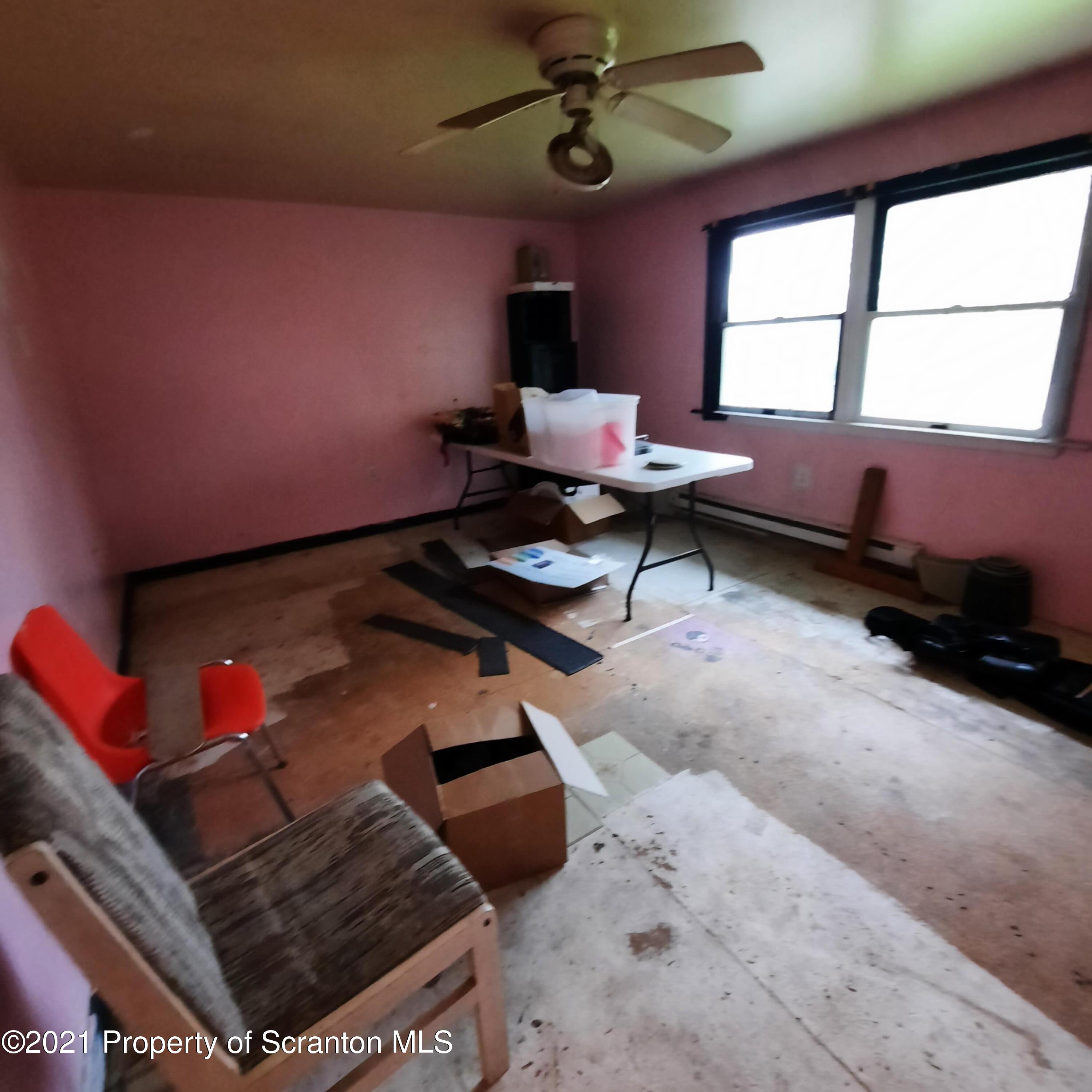 313 Marshal Squire Road Nicholson, PA 18446 - Photo 16 of 21 a living room with furniture and a window