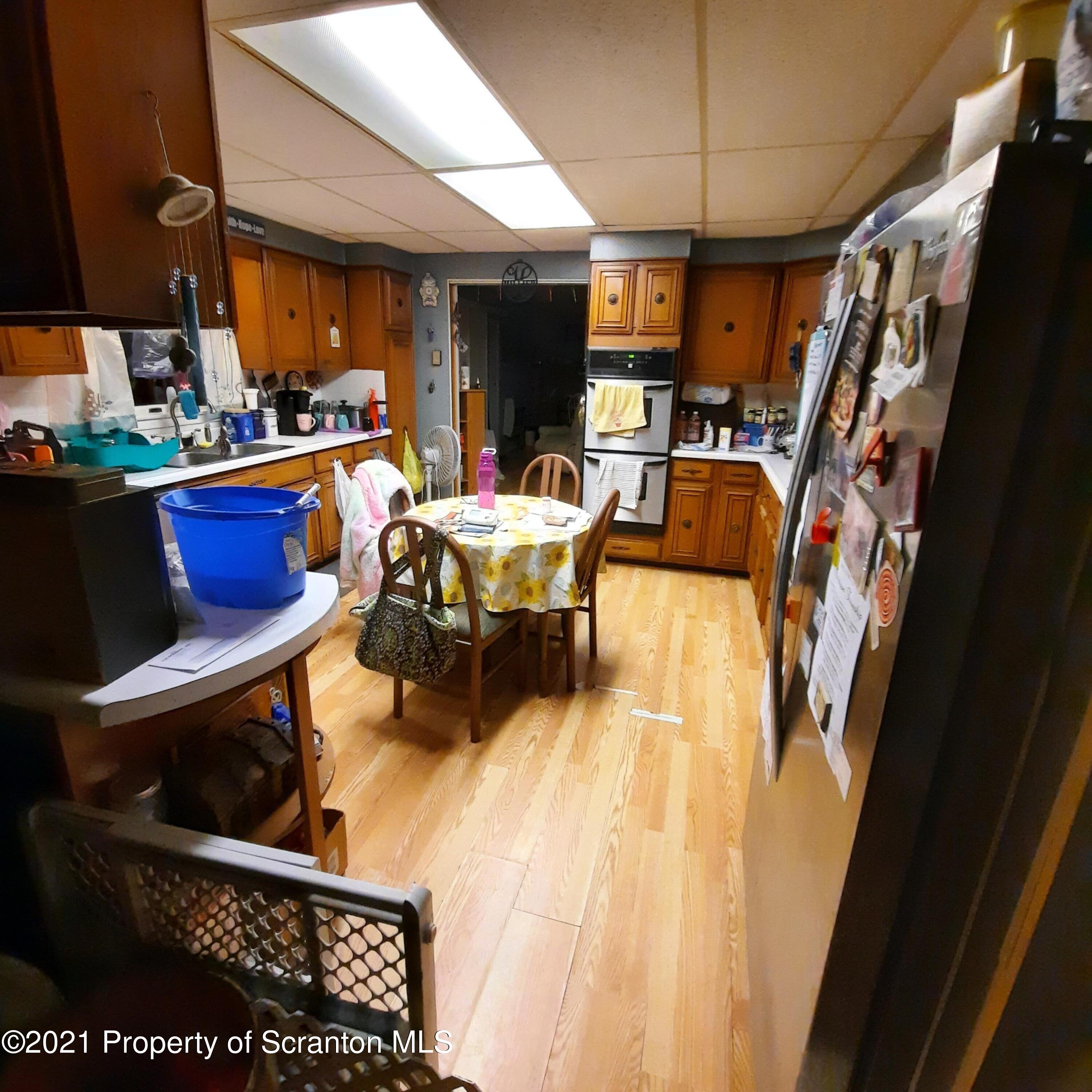 313 Marshal Squire Road Nicholson, PA 18446 - Photo 3 of 21 a workspace with furniture