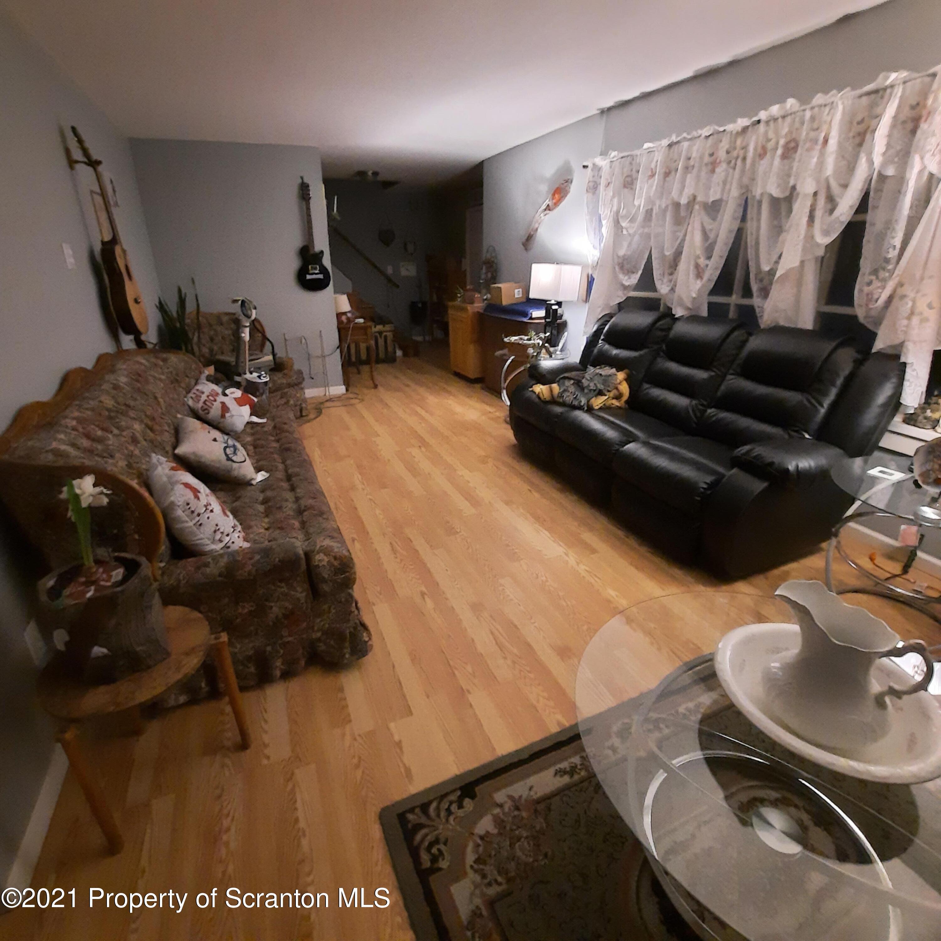 313 Marshal Squire Road Nicholson, PA 18446 - Photo 5 of 21 a bed room with furniture and a rug