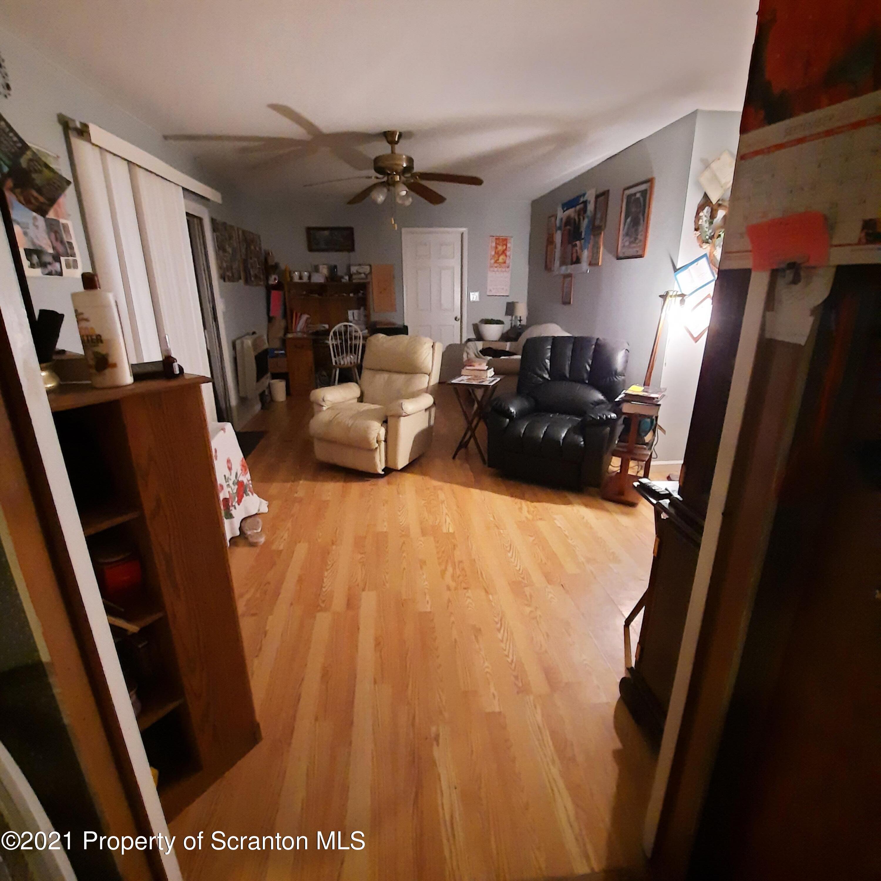 313 Marshal Squire Road Nicholson, PA 18446 - Photo 6 of 21 a bed room with furniture and a window