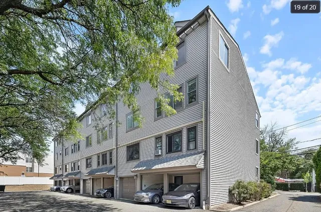 a view of a building with a street