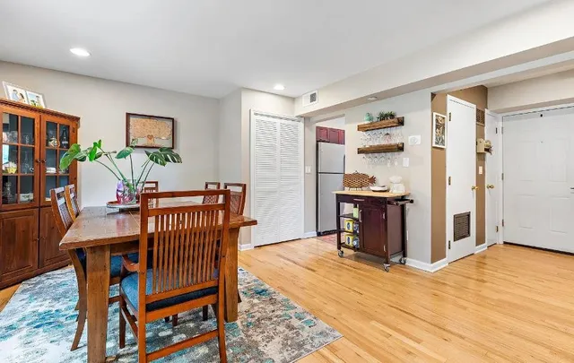 a view of a livingroom with furniture and wooden floor