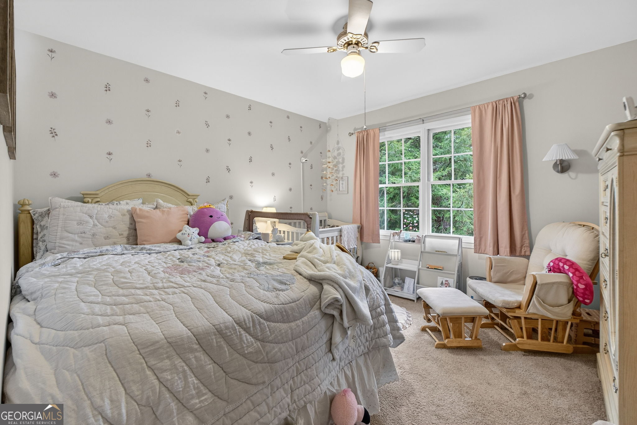 209 Laramie Road Griffin, GA 30224 - Photo 25 of 36 a bedroom with a bed and a window