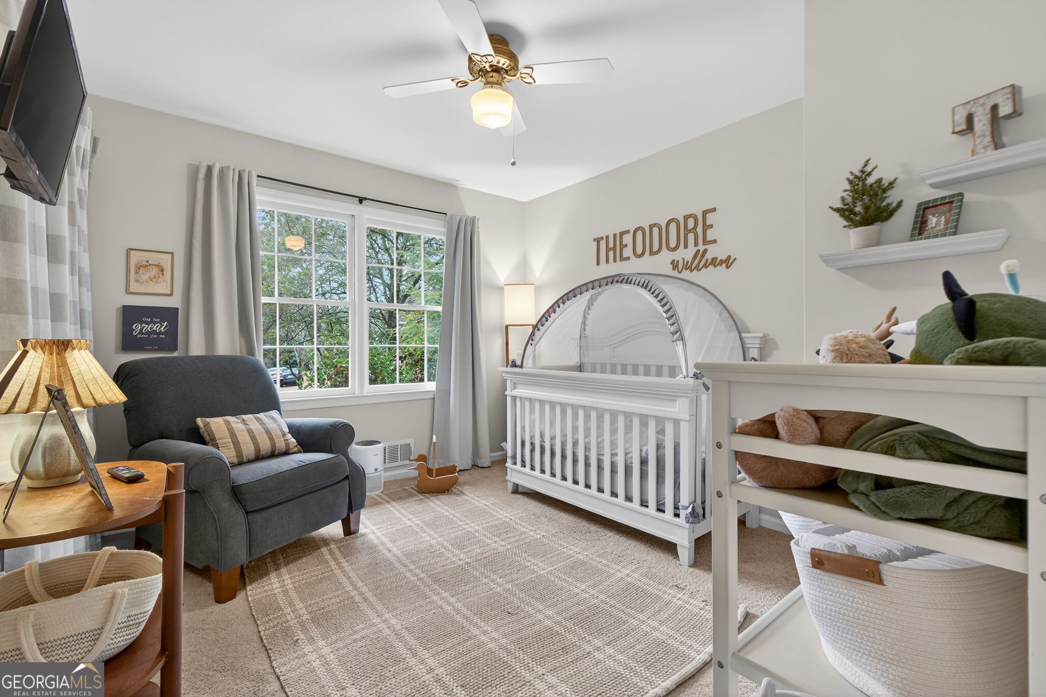 209 Laramie Road Griffin, GA 30224 - Photo 28 of 36 a bedroom with furniture and a window