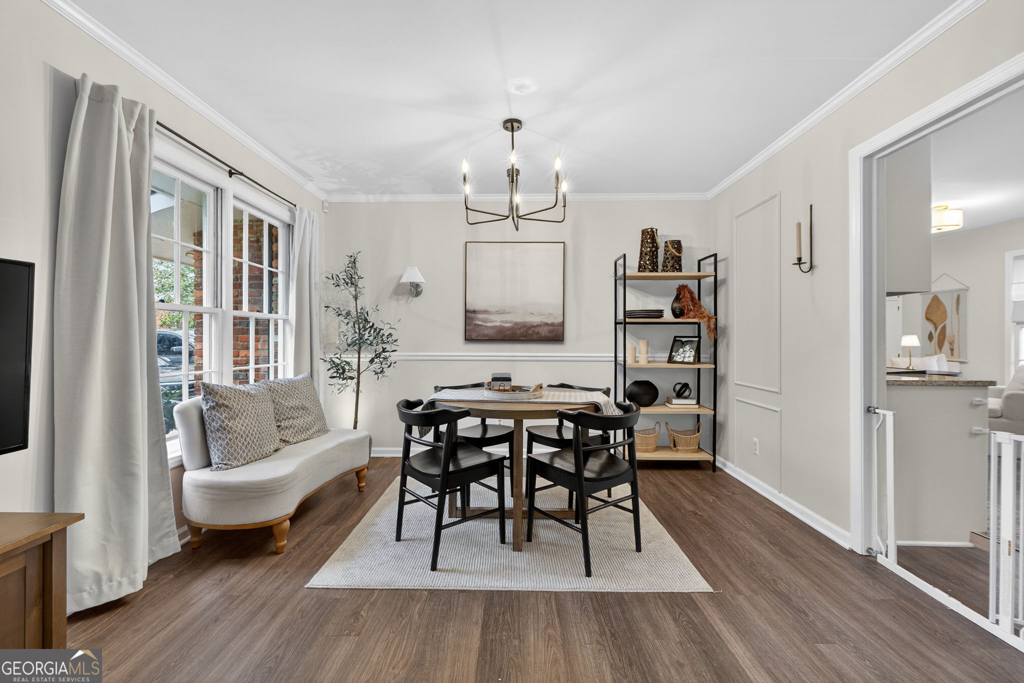 209 Laramie Road Griffin, GA 30224 - Photo 3 of 36 a view of a dining room with furniture window and wooden floor