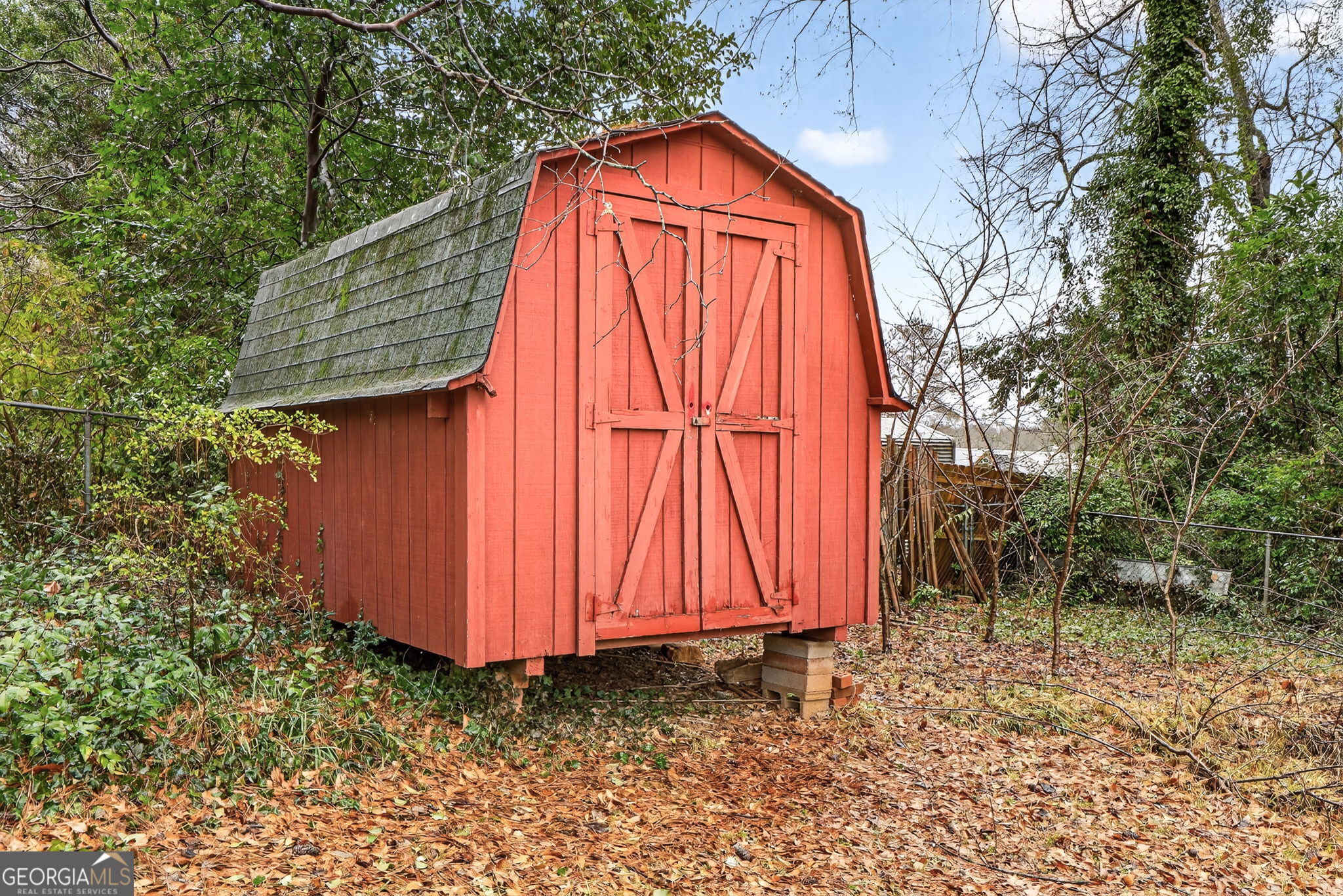 209 Laramie Road Griffin, GA 30224 - Photo 35 of 36 an outdoor view of house with backyard