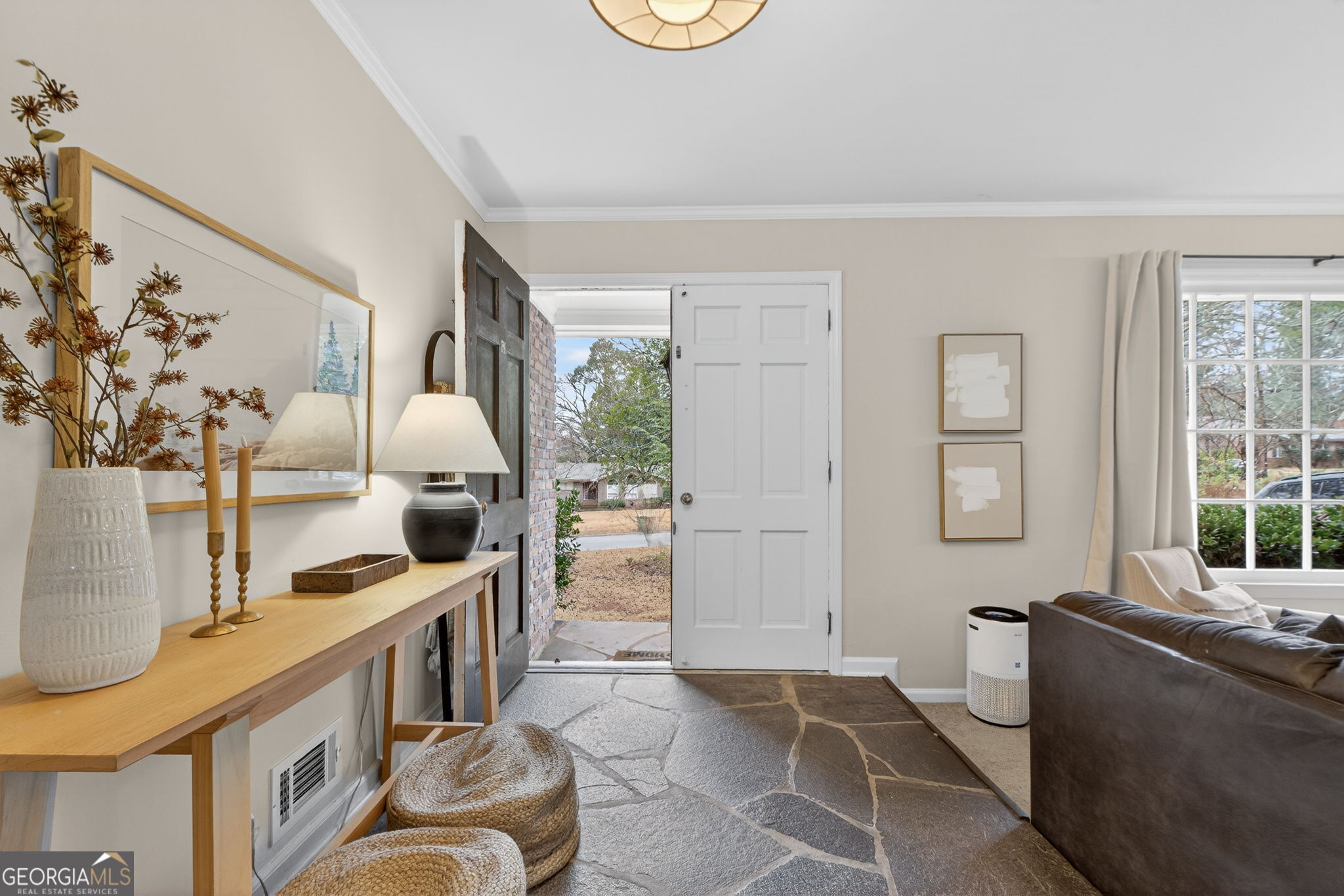 209 Laramie Road Griffin, GA 30224 - Photo 8 of 36 a living room with furniture and a window