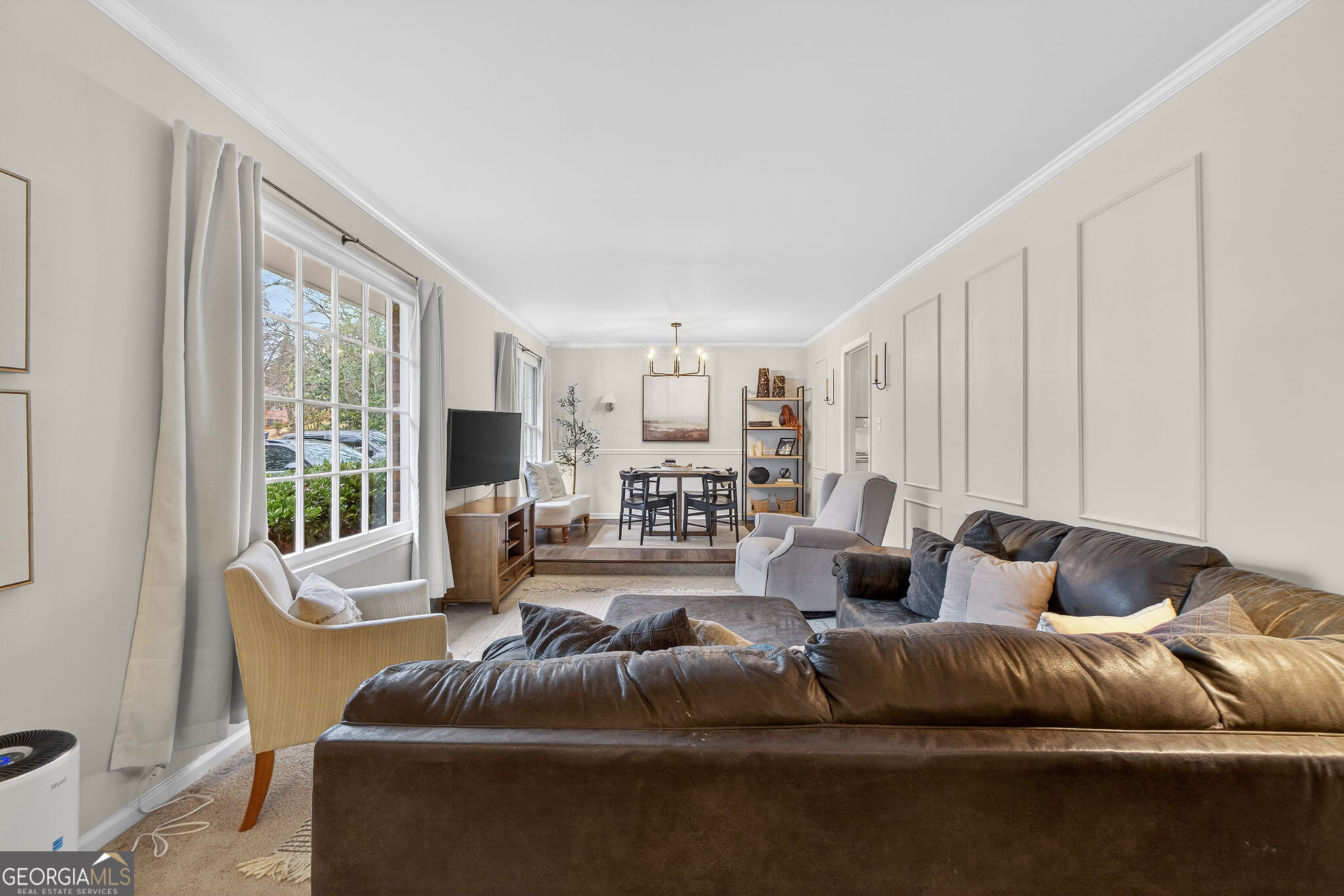 209 Laramie Road Griffin, GA 30224 - Photo 10 of 36 a living room with furniture and a large window