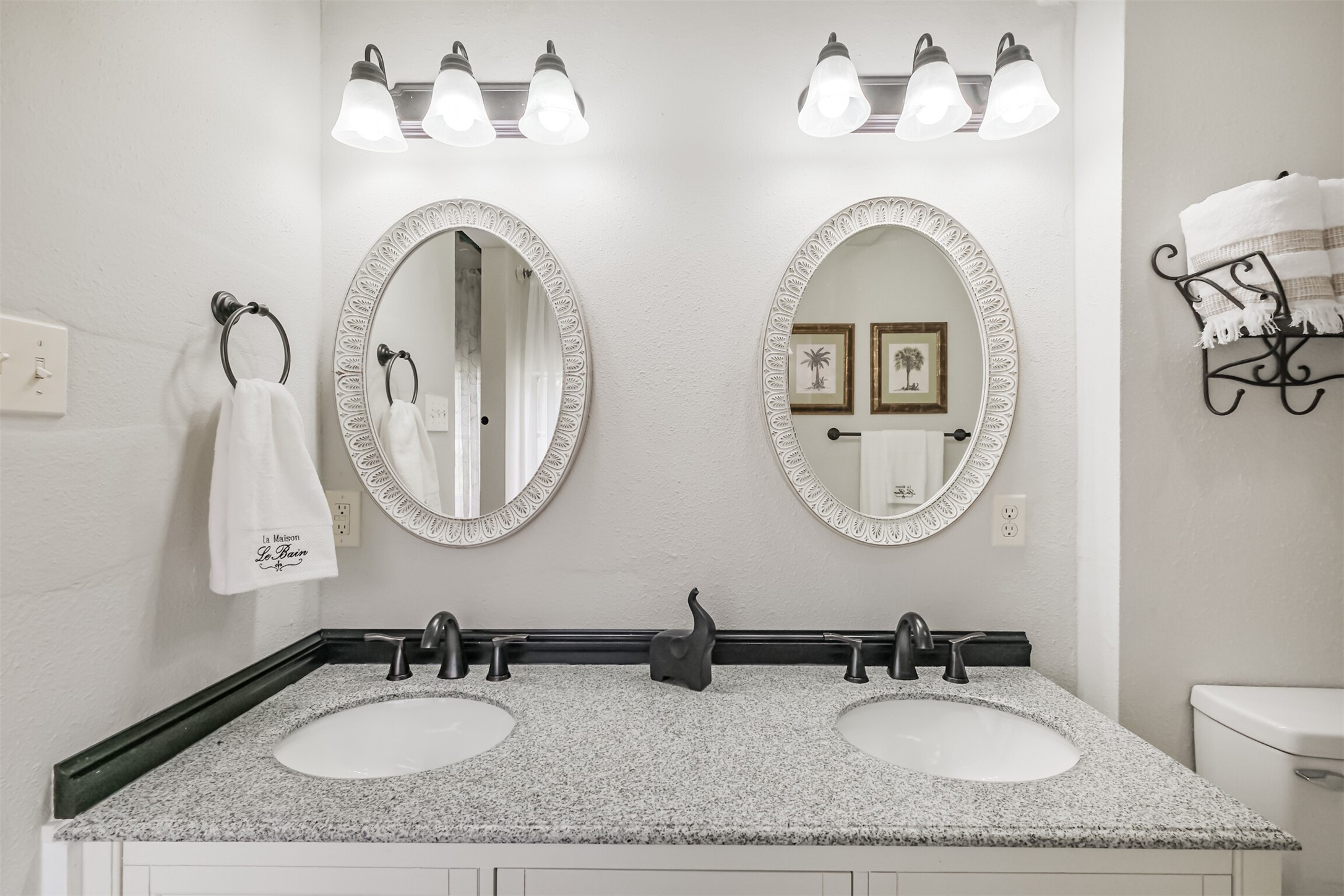 2705 Parrott Avenue Rosenberg, TX 77471 - Photo 20 of 37 a bathroom with a granite countertop double vanity sinks and a mirror