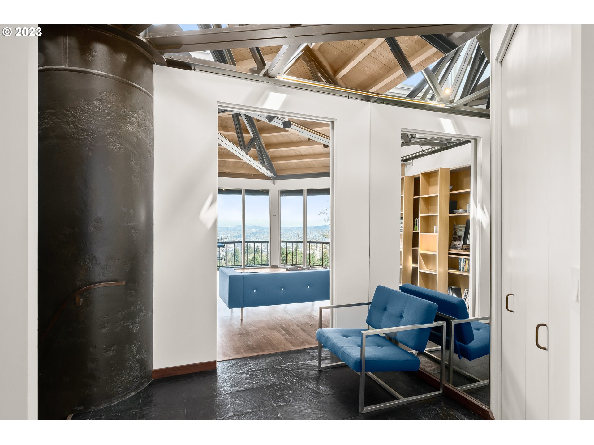 2880 Southwest Fairmount Boulevard Portland, OR 97239 - Photo 5 of 24 a workspace room with wooden floor and windows