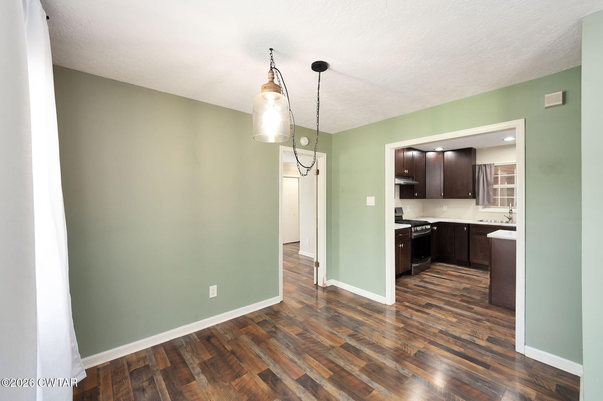 306 Jim Jackson Road Humboldt, TN 38343 - Photo 10 of 29 a view of a room with a flat screen tv