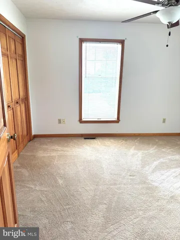 an empty room with window