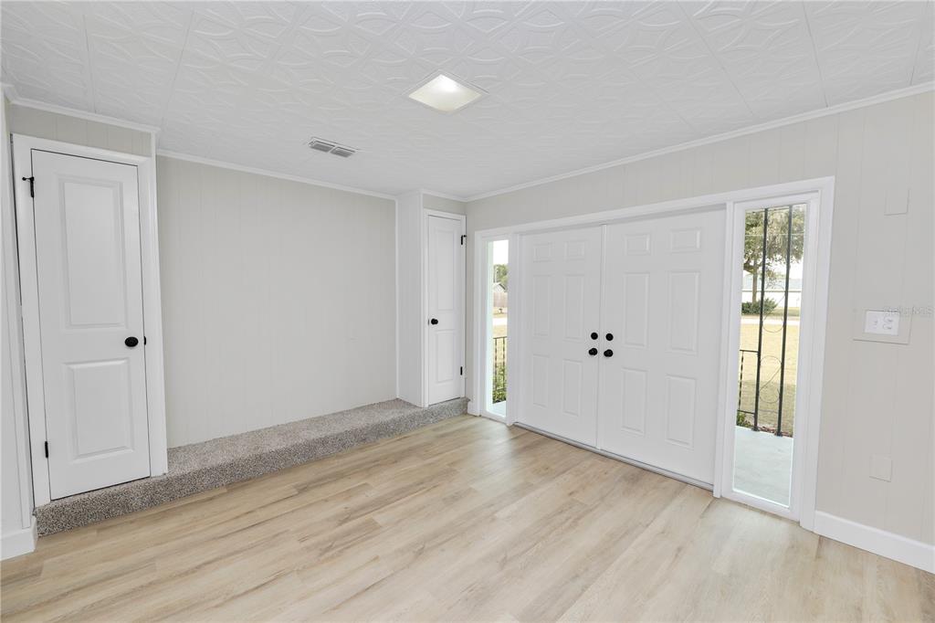 5105 Hayes Road Lakeland, FL 33811 - Photo 13 of 43 a view of an empty room with wooden floor