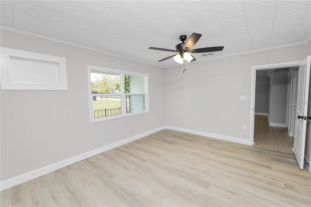 5105 Hayes Road Lakeland, FL 33811 - Photo 15 of 43 wooden floor in an empty room with a window