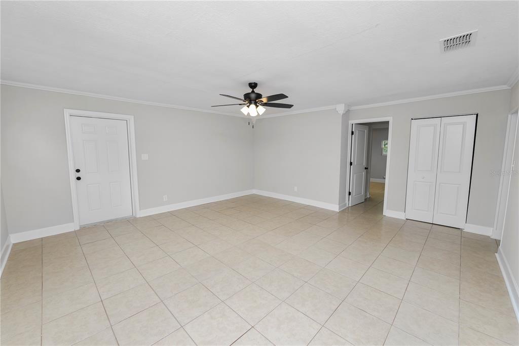 5105 Hayes Road Lakeland, FL 33811 - Photo 17 of 43 a view of an empty room with a ceiling fan
