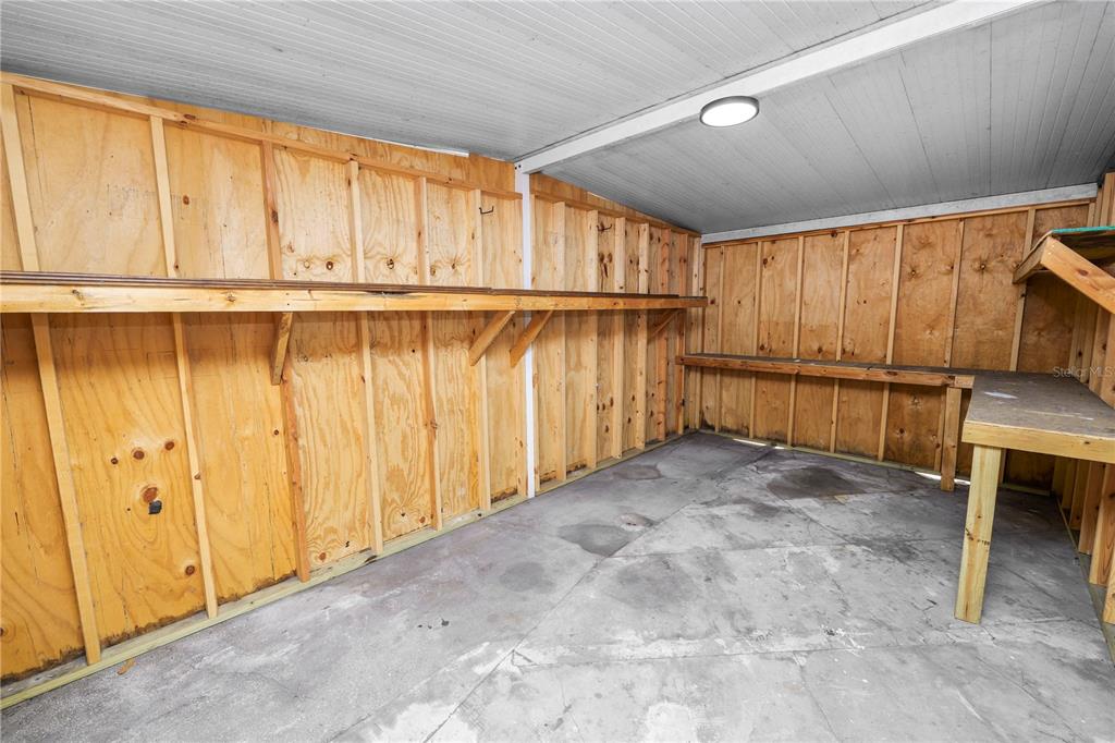 5105 Hayes Road Lakeland, FL 33811 - Photo 35 of 43 a view of a porch with wooden floor and furniture